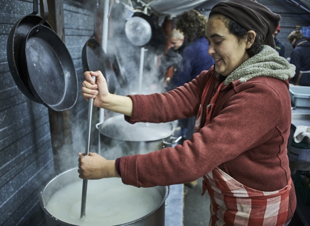 Help Refugees Charity worker volunteering in the kitchen.