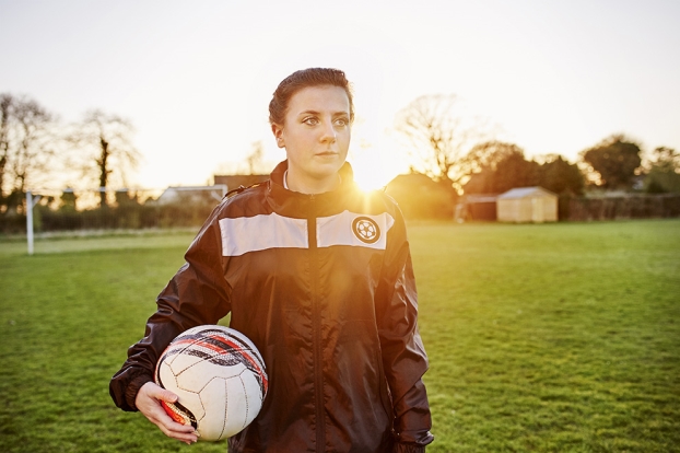 Stock image of a female footballer.