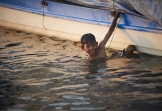 Boy in Siem Reap river.